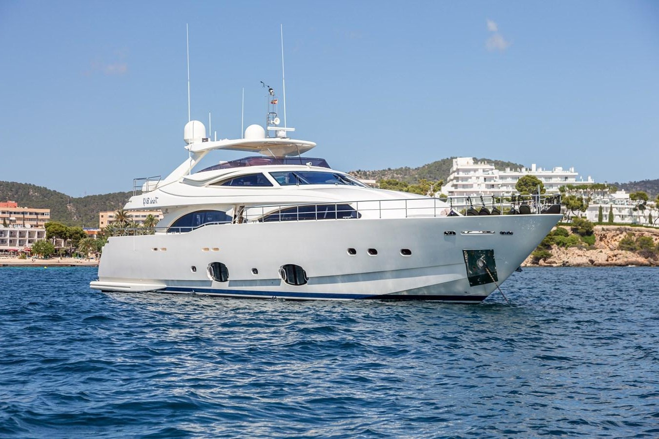 a white yacht in the water aboard THINK BIG Yacht for Sale