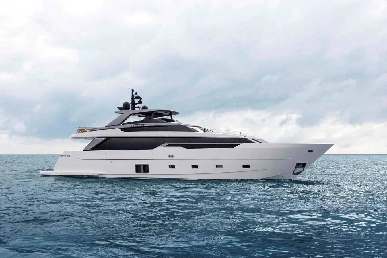 a white yacht in the water aboard INVICTUS Yacht for Sale