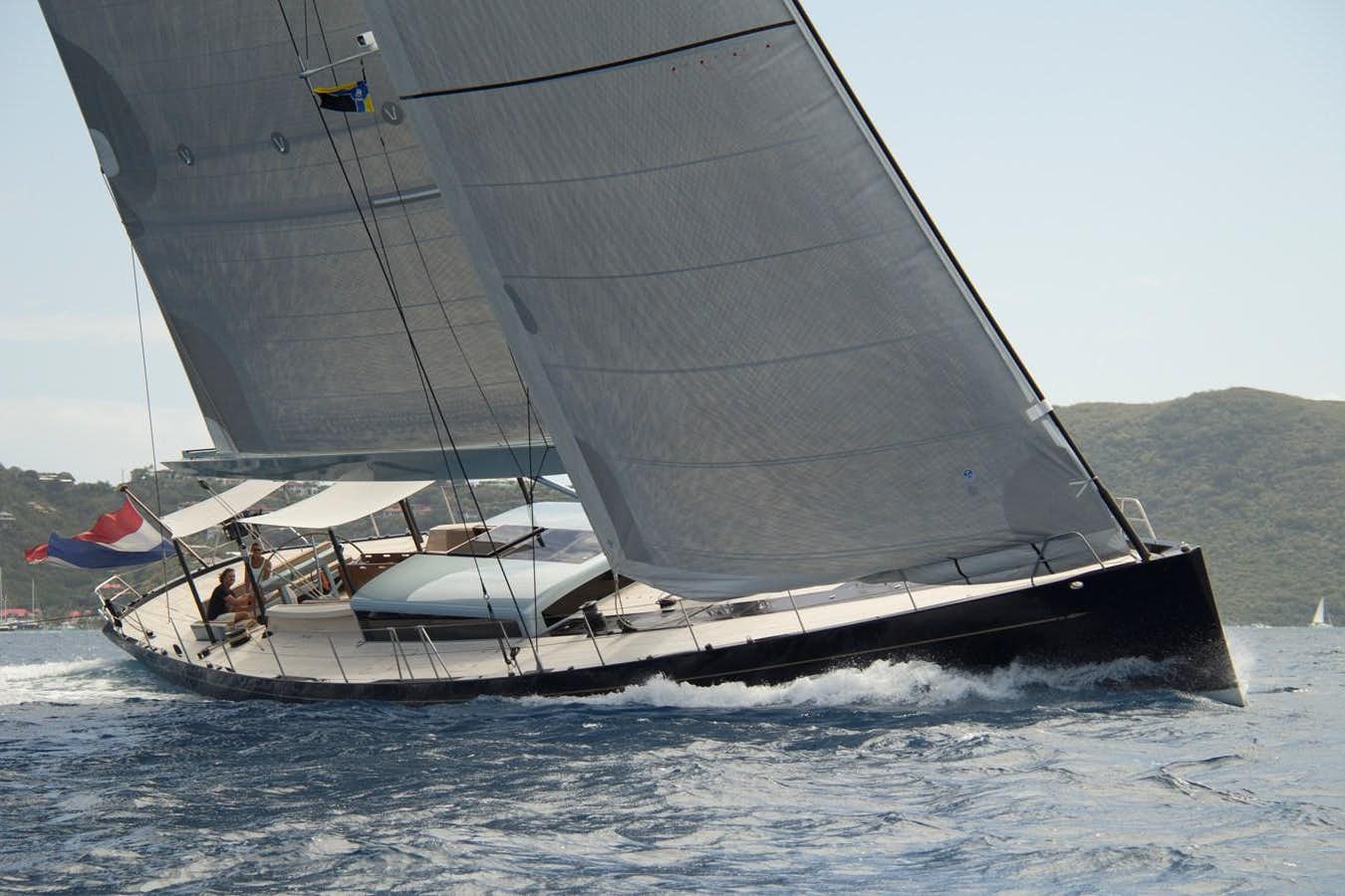 a sailboat on the water aboard TULIP Yacht for Sale