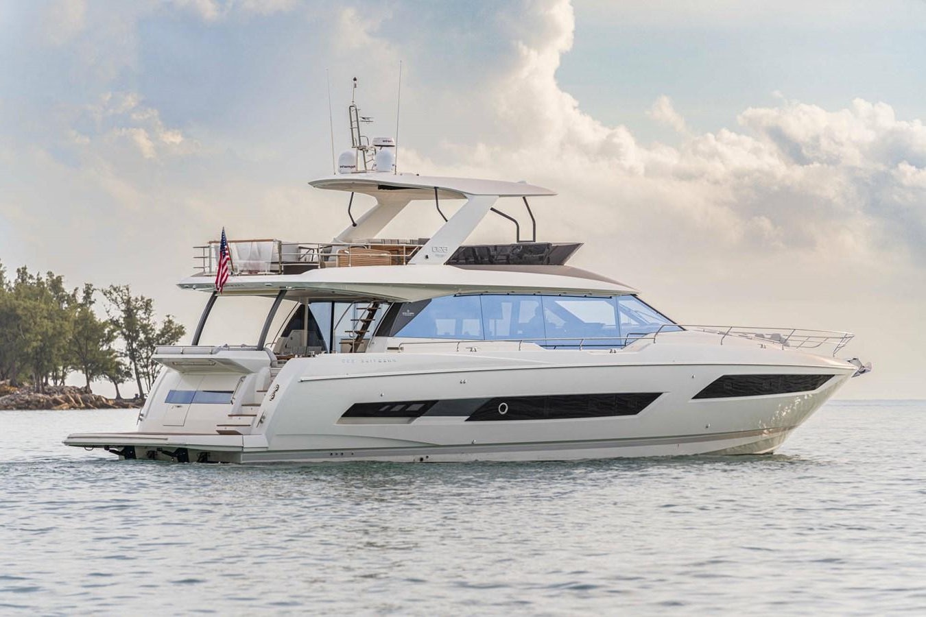 a white boat on the water aboard 690 F LINE  Yacht for Sale