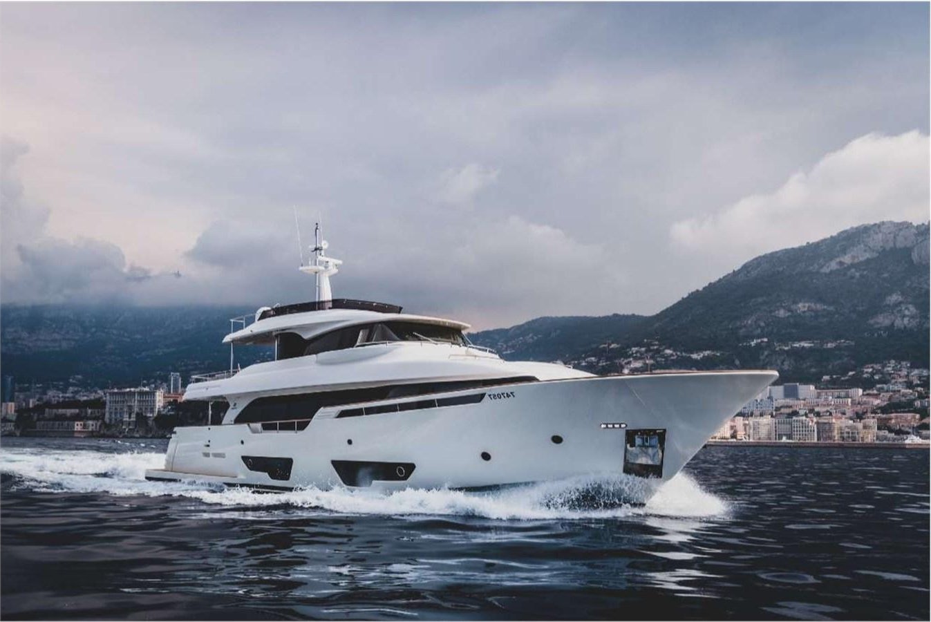 a white yacht on the water aboard SEVEN Yacht for Sale
