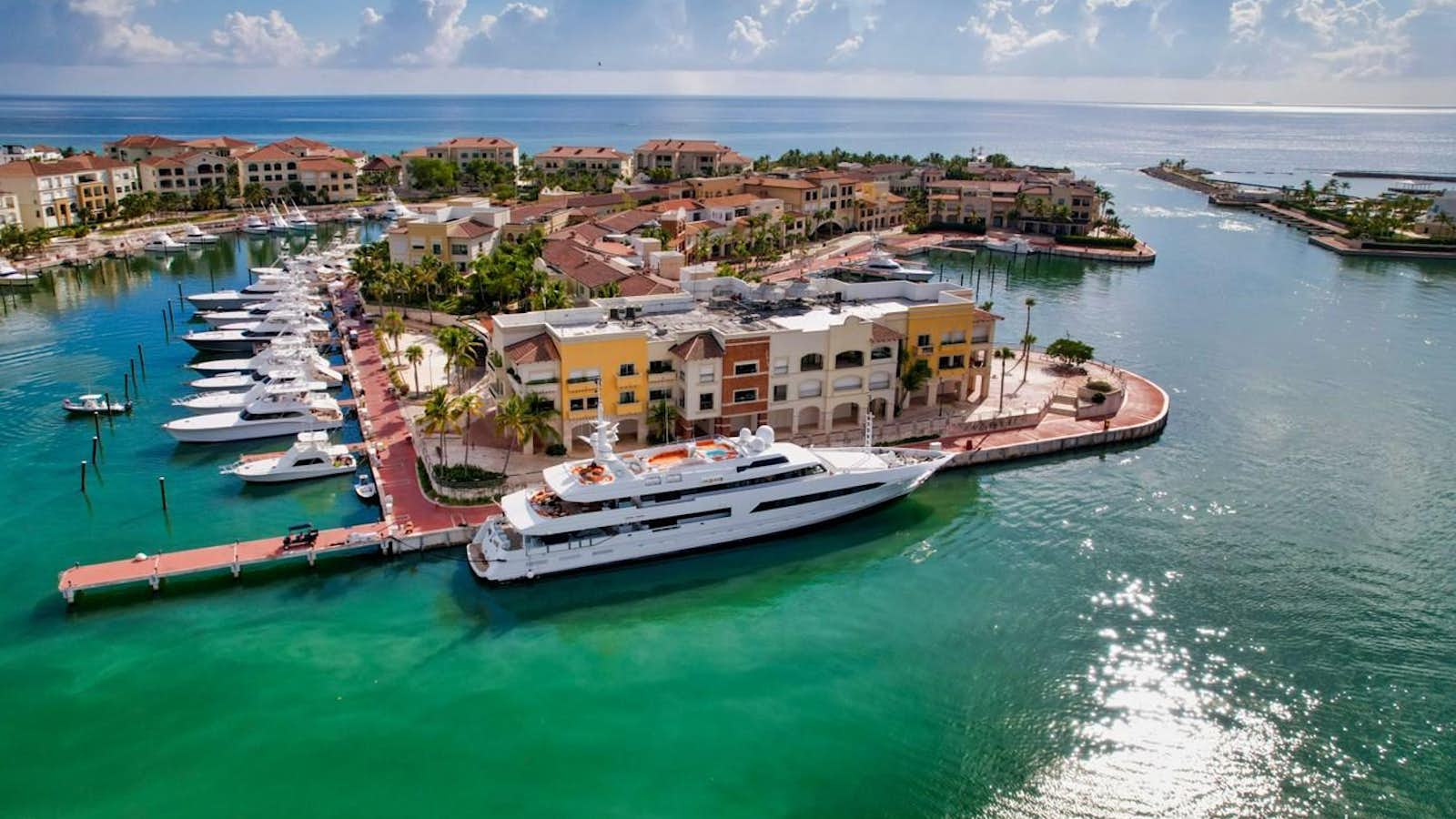 a large building on a dock aboard BAD GIRL Yacht for Sale