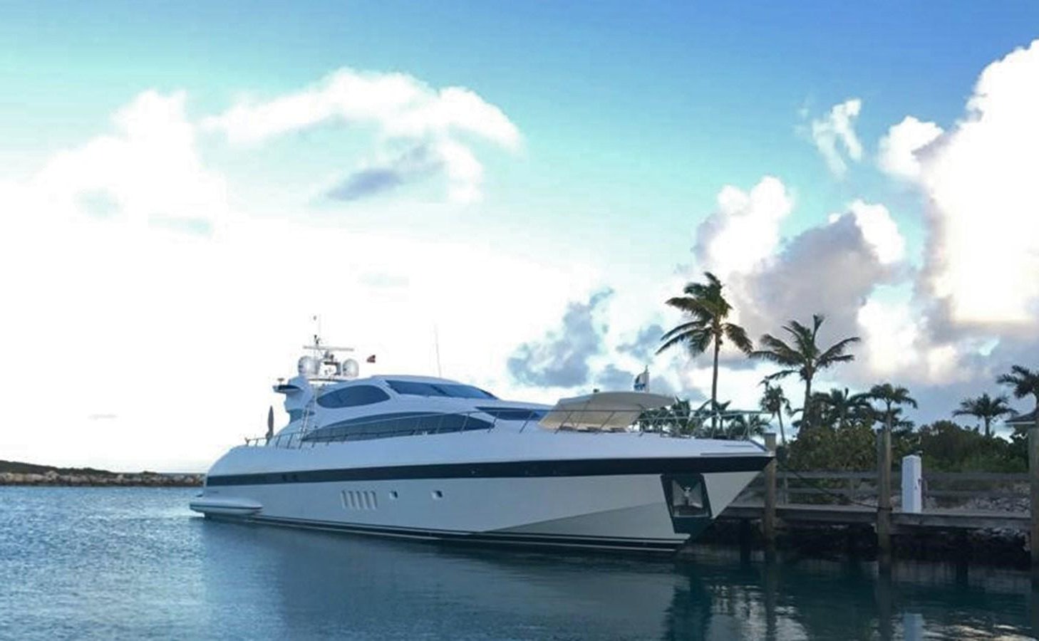 a white yacht on the water aboard EYE PLAY Yacht for Sale