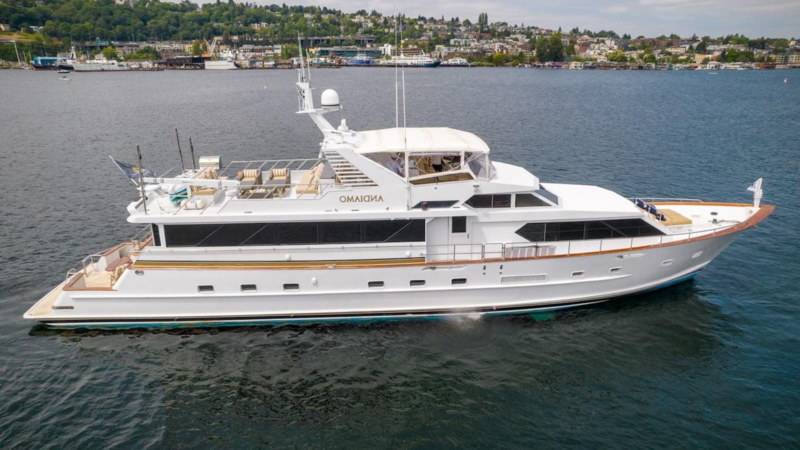 a large white yacht in the water aboard ANDIAMO Yacht for Sale