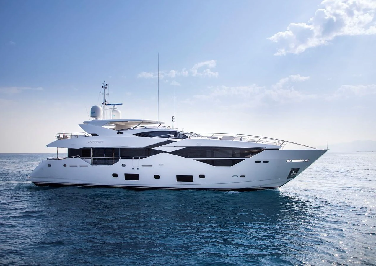a white yacht on the water aboard FREEDOM Yacht for Sale