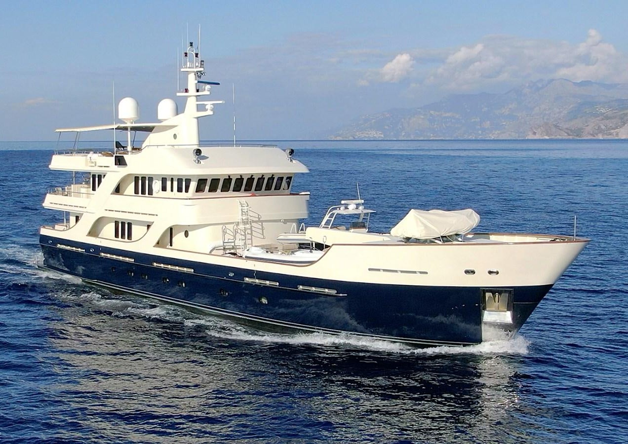 a white yacht in the water aboard LIBERTA Yacht for Sale