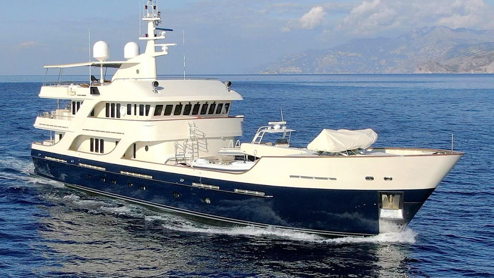 a white yacht in the water aboard LIBERTA Yacht for Sale