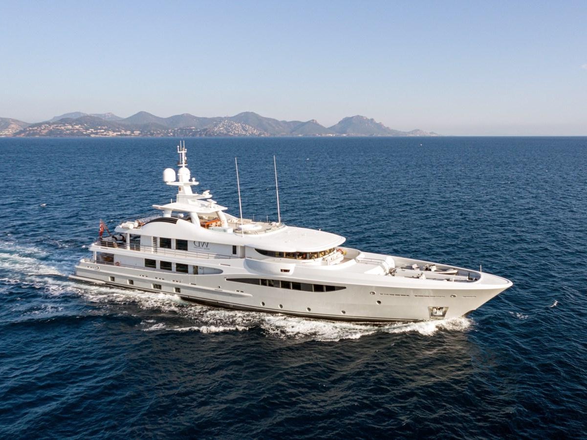 a white yacht on the water aboard WERE DREAMS Yacht for Sale