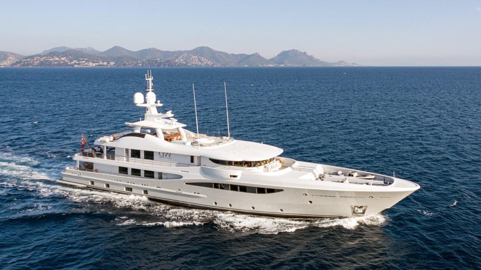 a white yacht on the water aboard WERE DREAMS Yacht for Sale