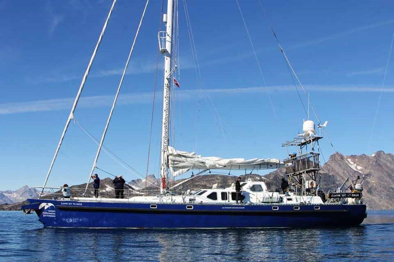 a boat with people on it aboard SONG OF THE WHALE Yacht for Sale
