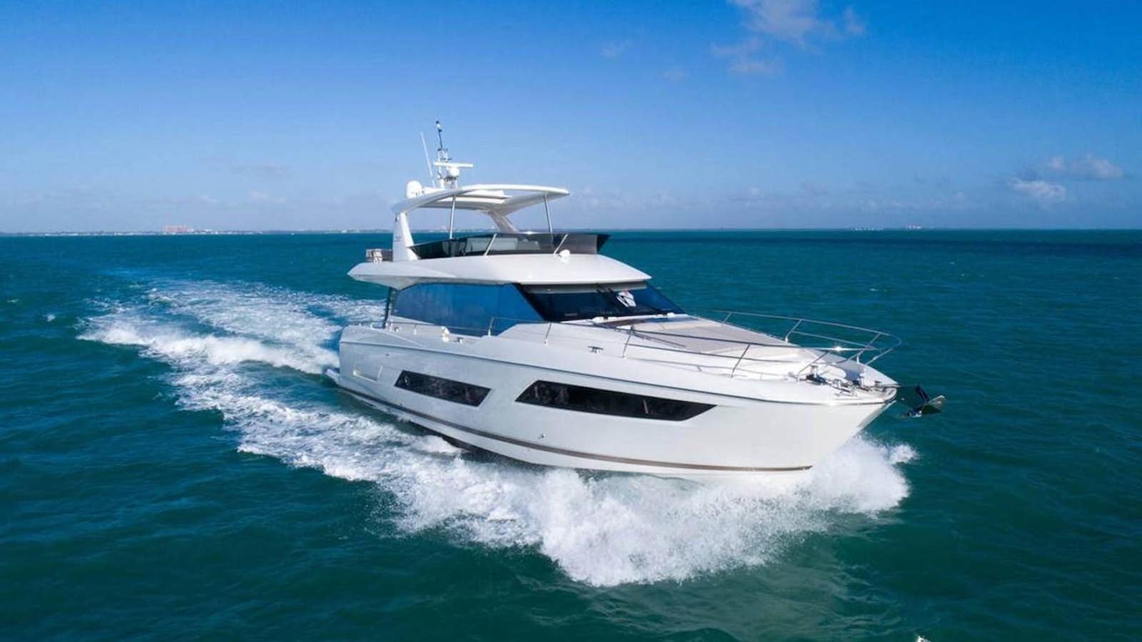 a white yacht on the water aboard MEIGA Yacht for Sale