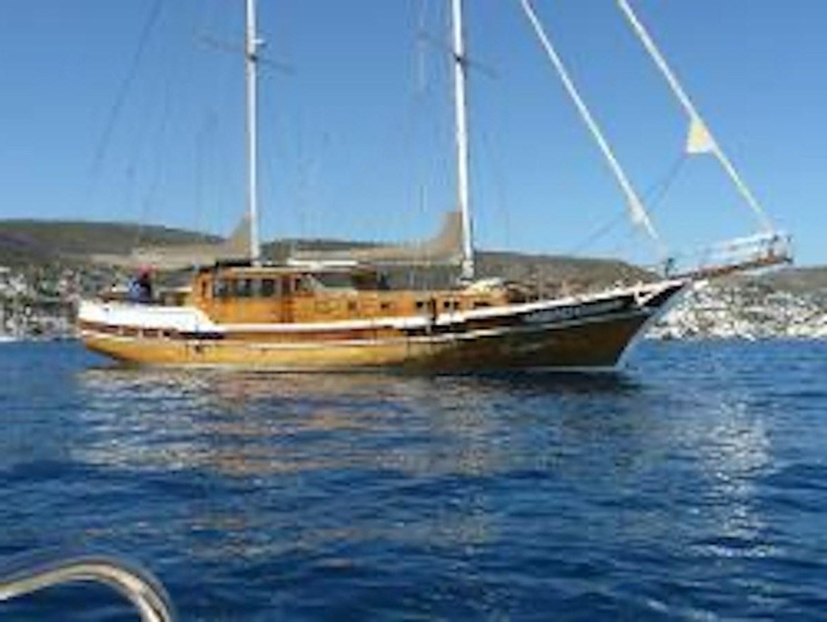 a boat on the water aboard 1998 CUSTOM SAILING YACHT Yacht for Sale