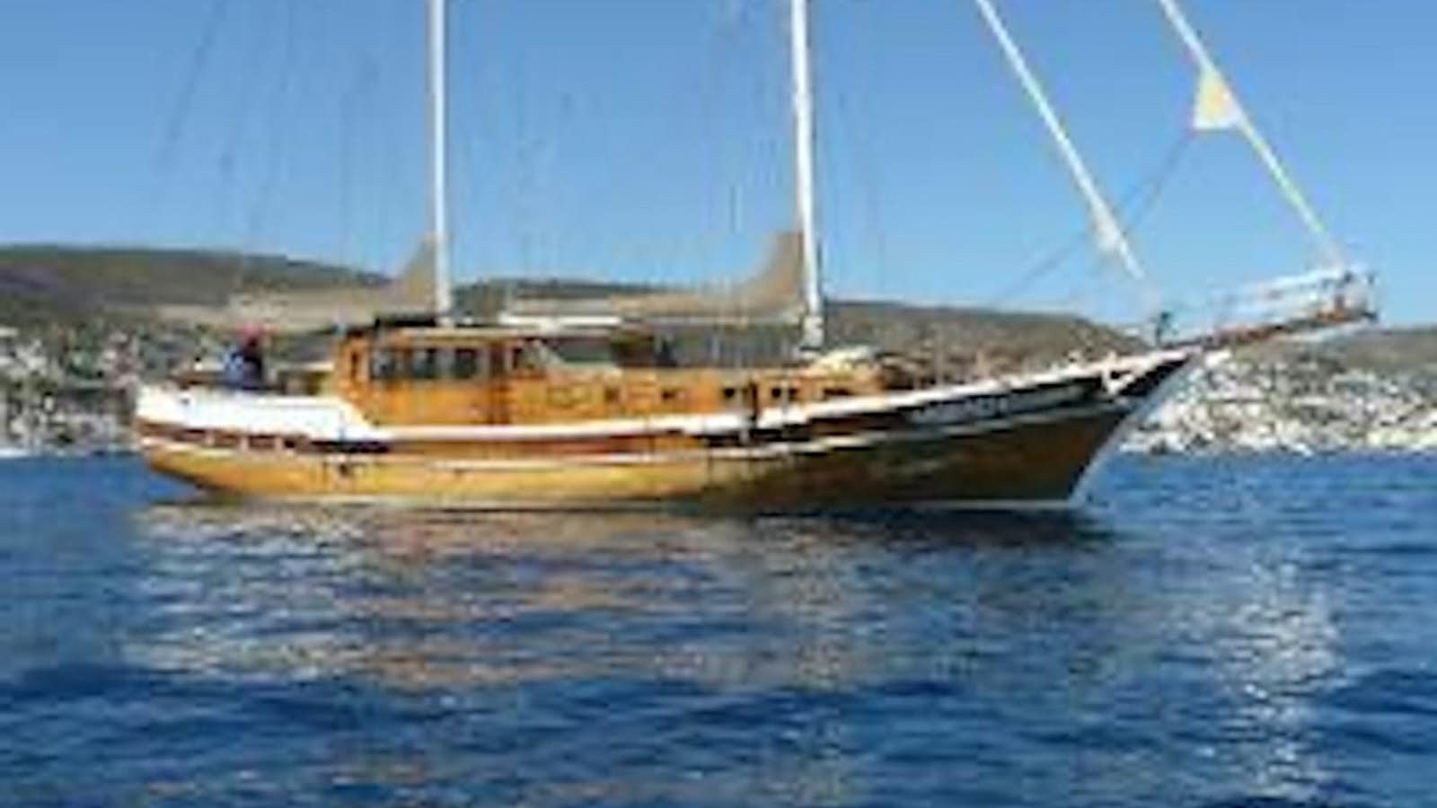 a boat on the water aboard 1998 CUSTOM SAILING YACHT Yacht for Sale