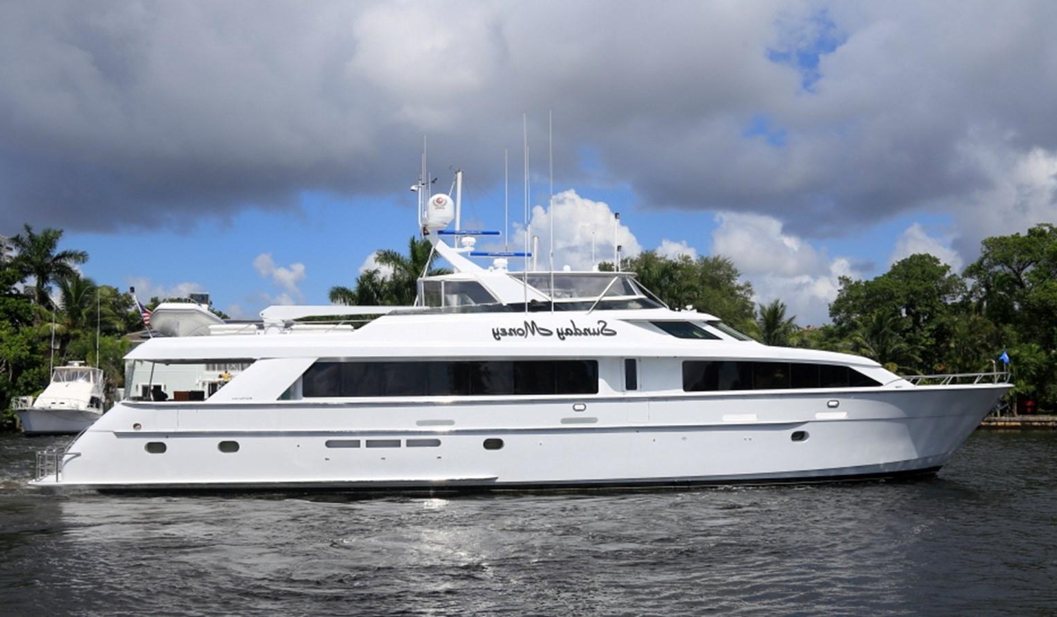 a white yacht in the water aboard SUNDAY MONEY Yacht for Sale