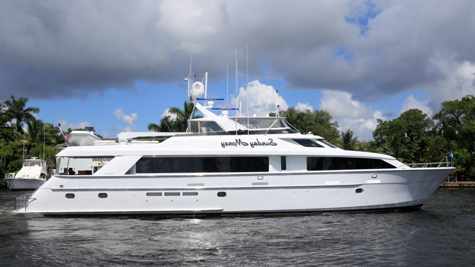 a white yacht in the water aboard SUNDAY MONEY Yacht for Sale