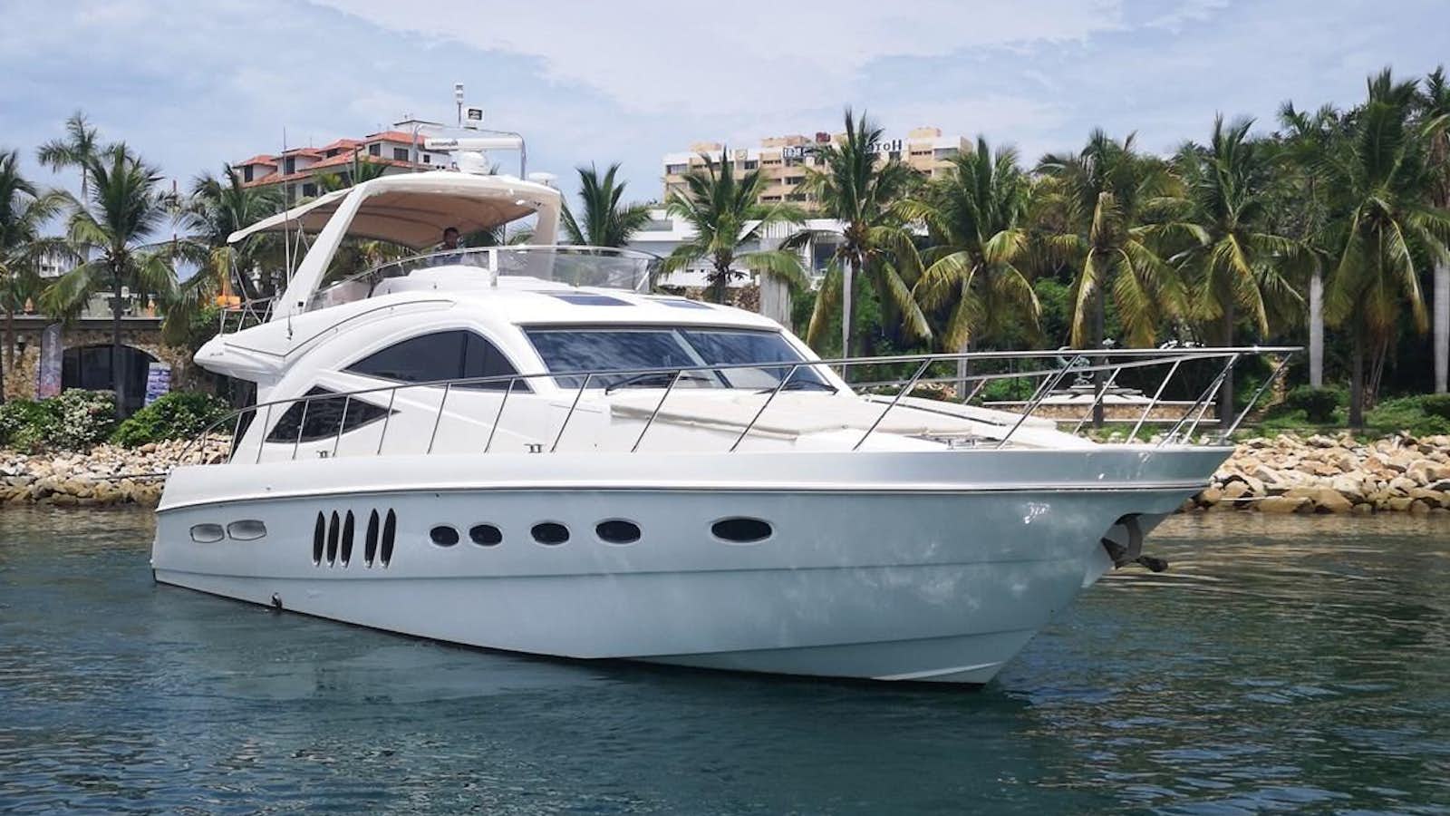 a boat in the water aboard 2008 SEALINE T60 @ ACAPULCO Yacht for Sale