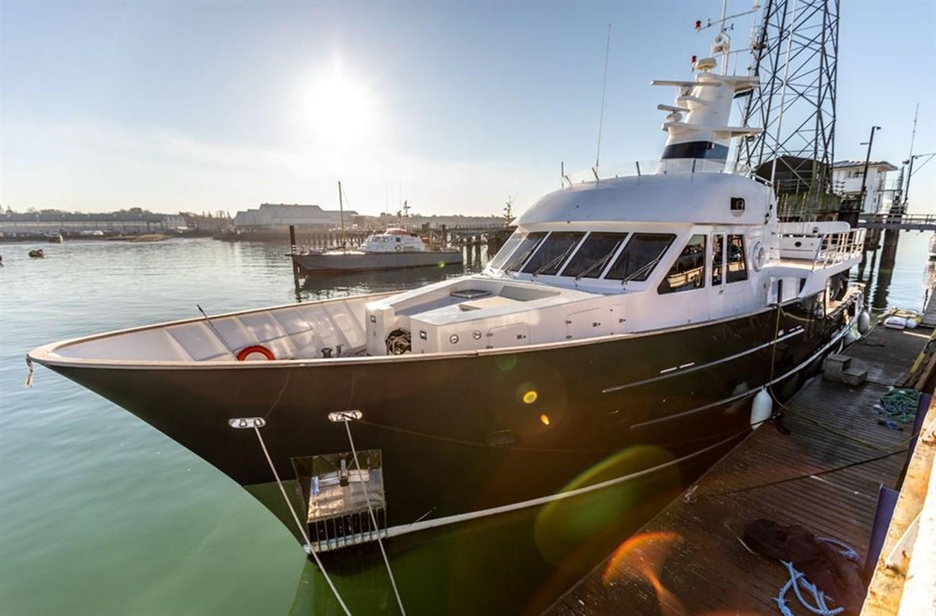 a large white boat docked aboard MRS ROBINSON Yacht for Sale
