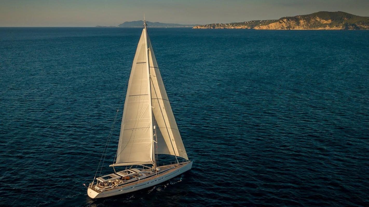a sailboat in the water aboard SAVARONA Yacht for Sale