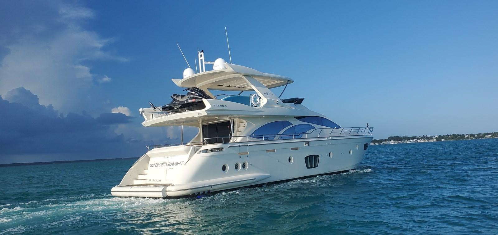 a white boat in the water aboard THINKS 'S HIS TOO Yacht for Sale