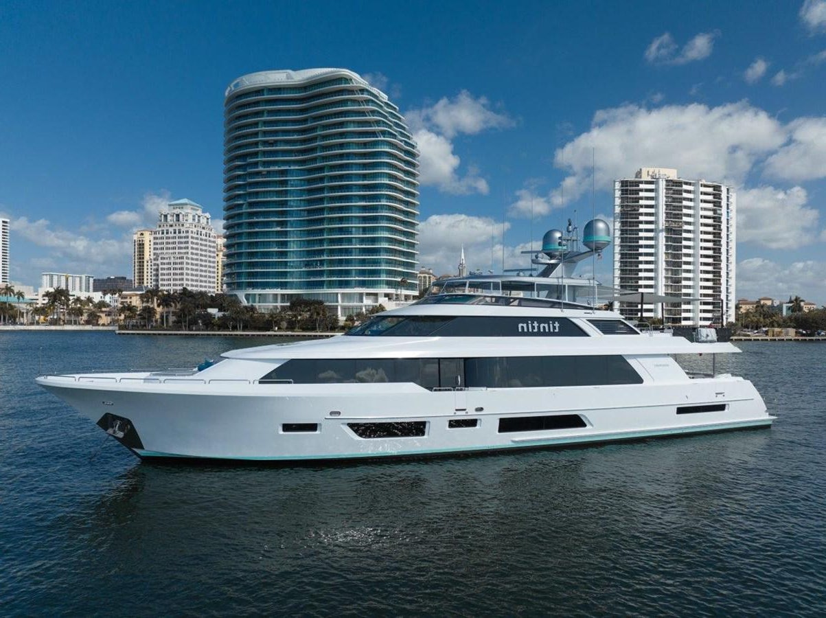 a white yacht in the water aboard RING-N-WET Yacht for Sale