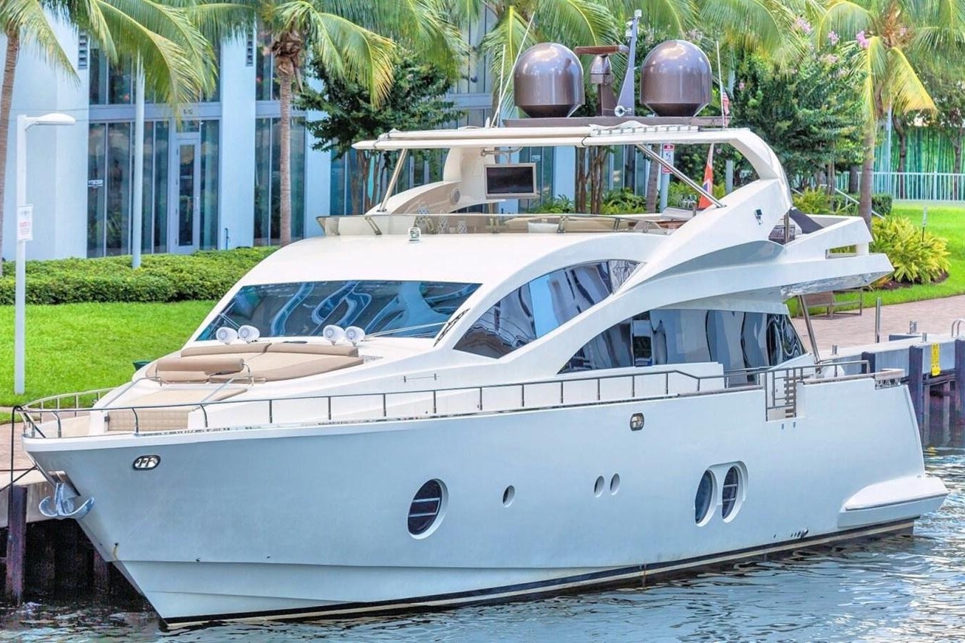 a white yacht on the water aboard KAERU Yacht for Sale
