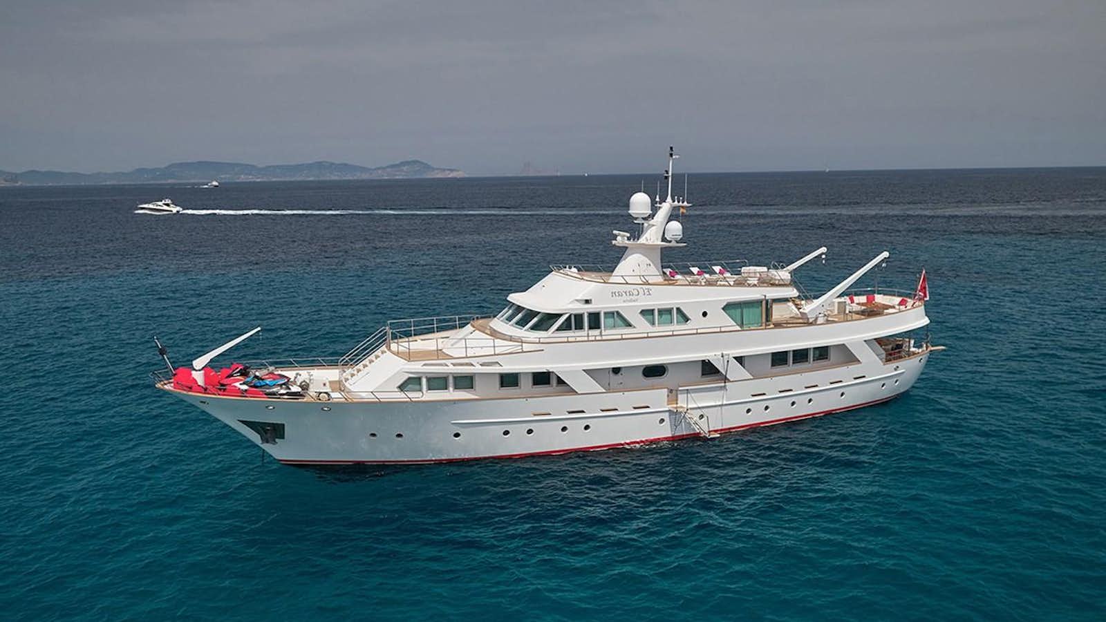 a large white boat in the water aboard EL CARAN Yacht for Sale