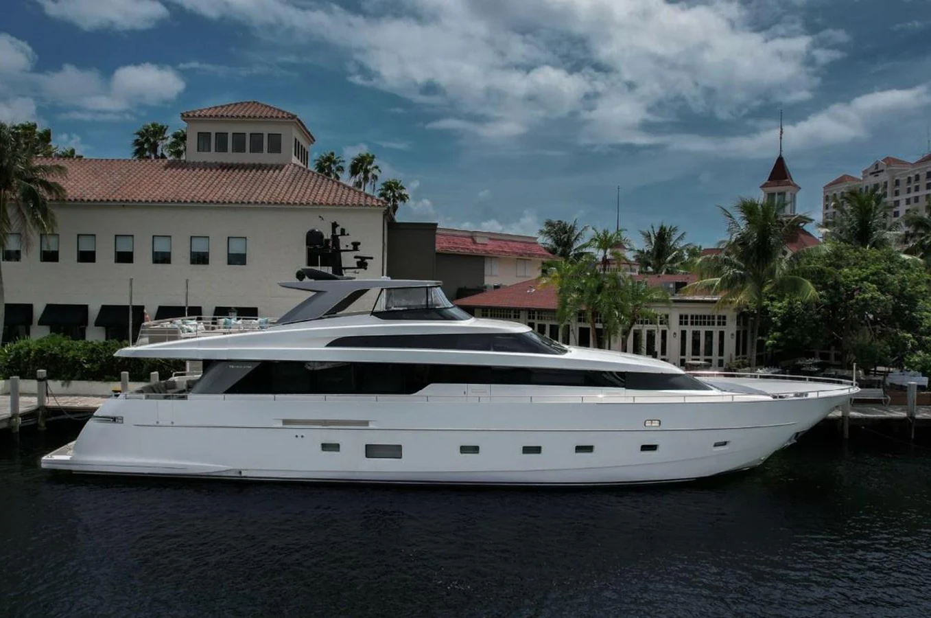 a white yacht in the water aboard ASTONISH Yacht for Sale