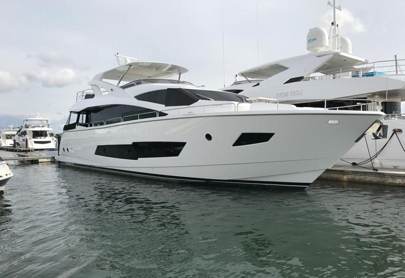 a white yacht in the water aboard TICKETYBOO Yacht for Sale