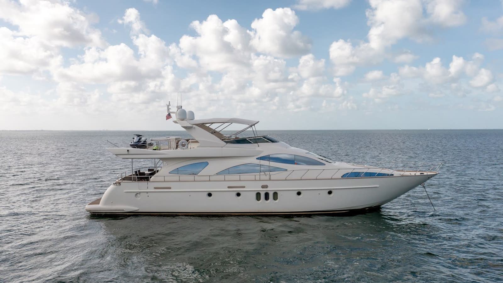 a white yacht in the water aboard AZIMUT 80 2003 Yacht for Sale