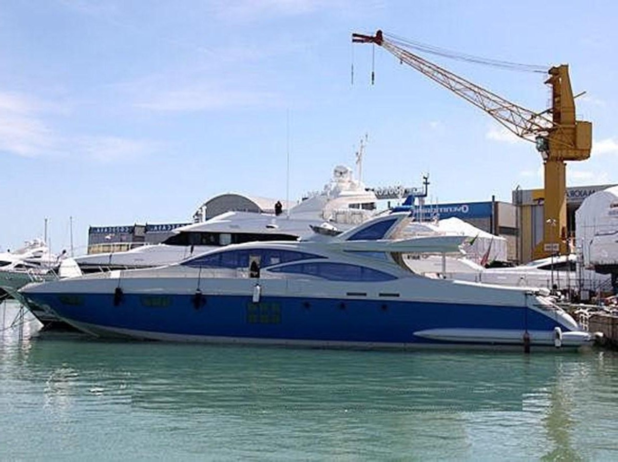 a large boat in the water aboard SURVIVOR Yacht for Sale