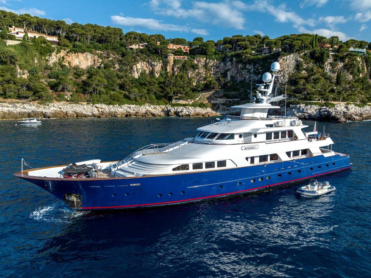 a large boat in the water aboard L'ALBATROS Yacht for Sale