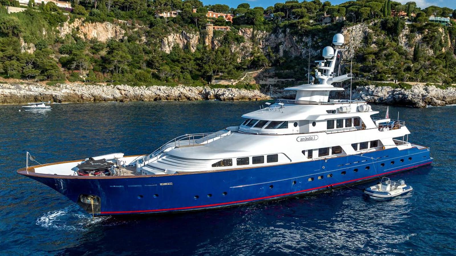 a large boat in the water aboard L'ALBATROS Yacht for Sale