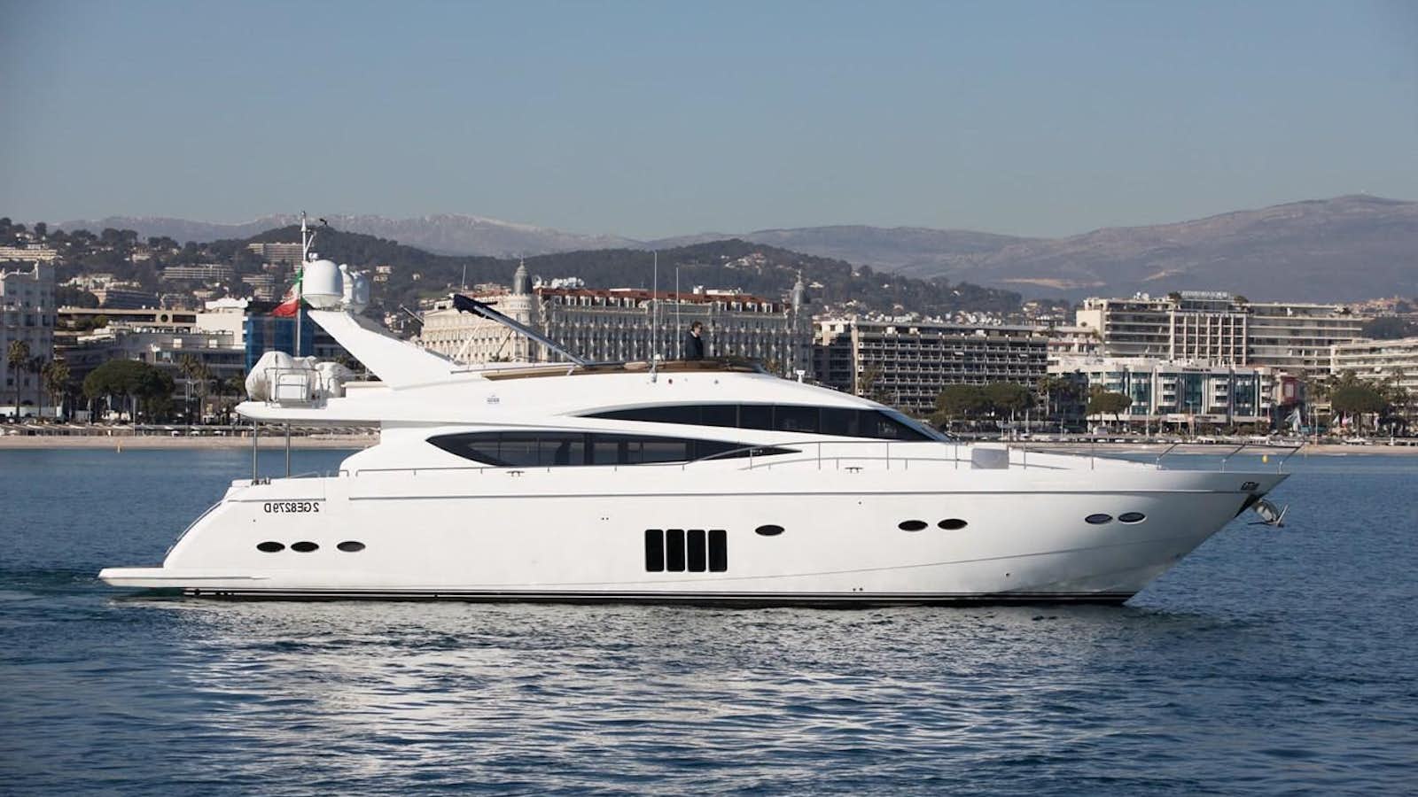 a white yacht in the water aboard 2009 PRINCESS 85 Yacht for Sale