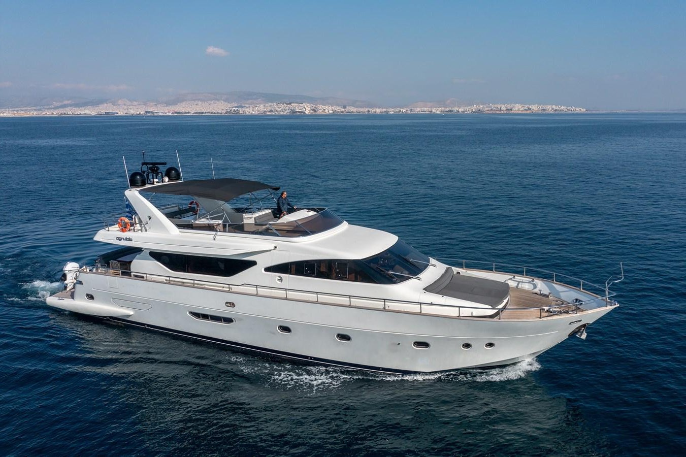a white yacht in the water aboard SALTY Yacht for Sale