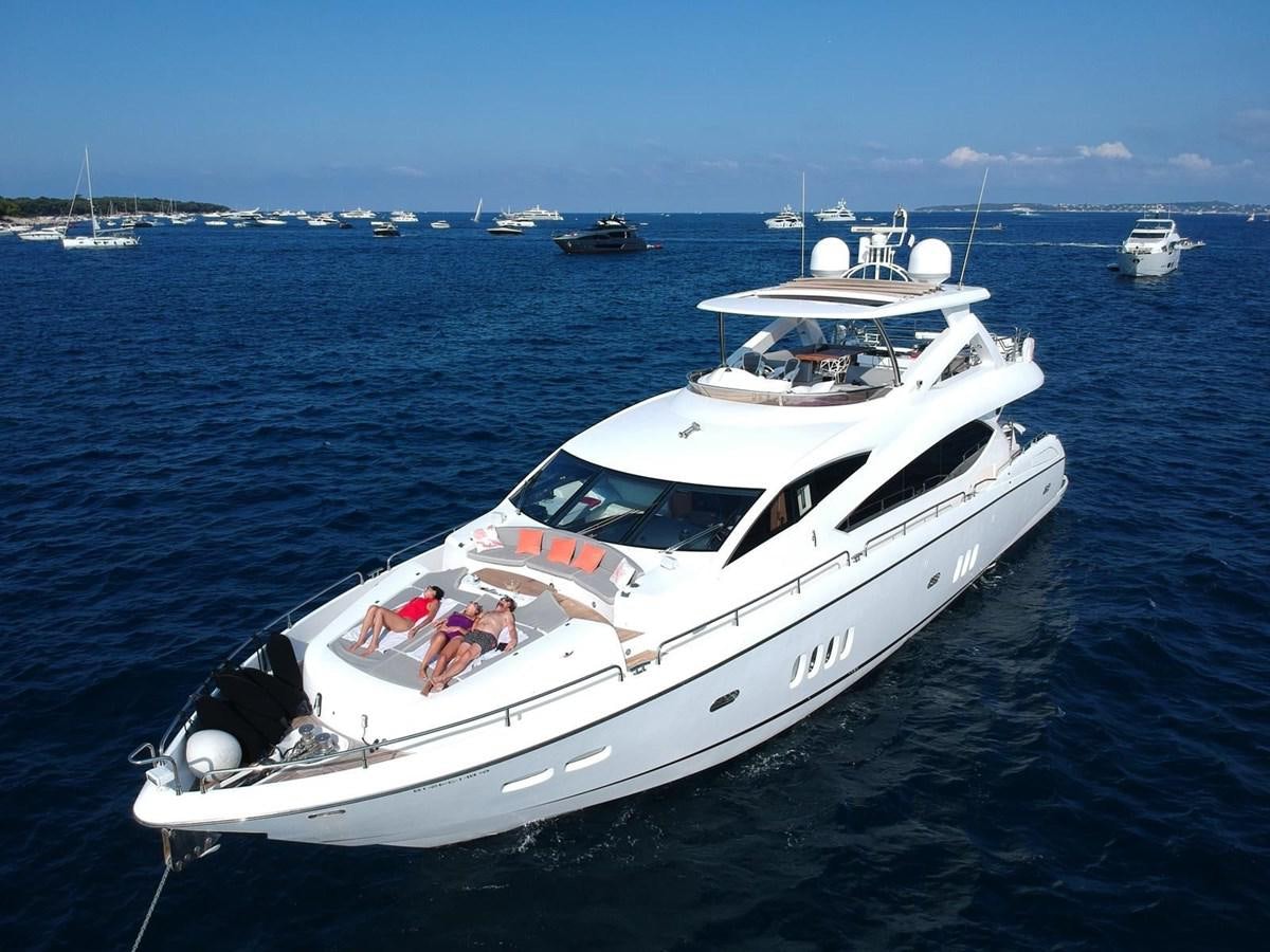 a white boat in the water aboard LIJOR Yacht for Sale