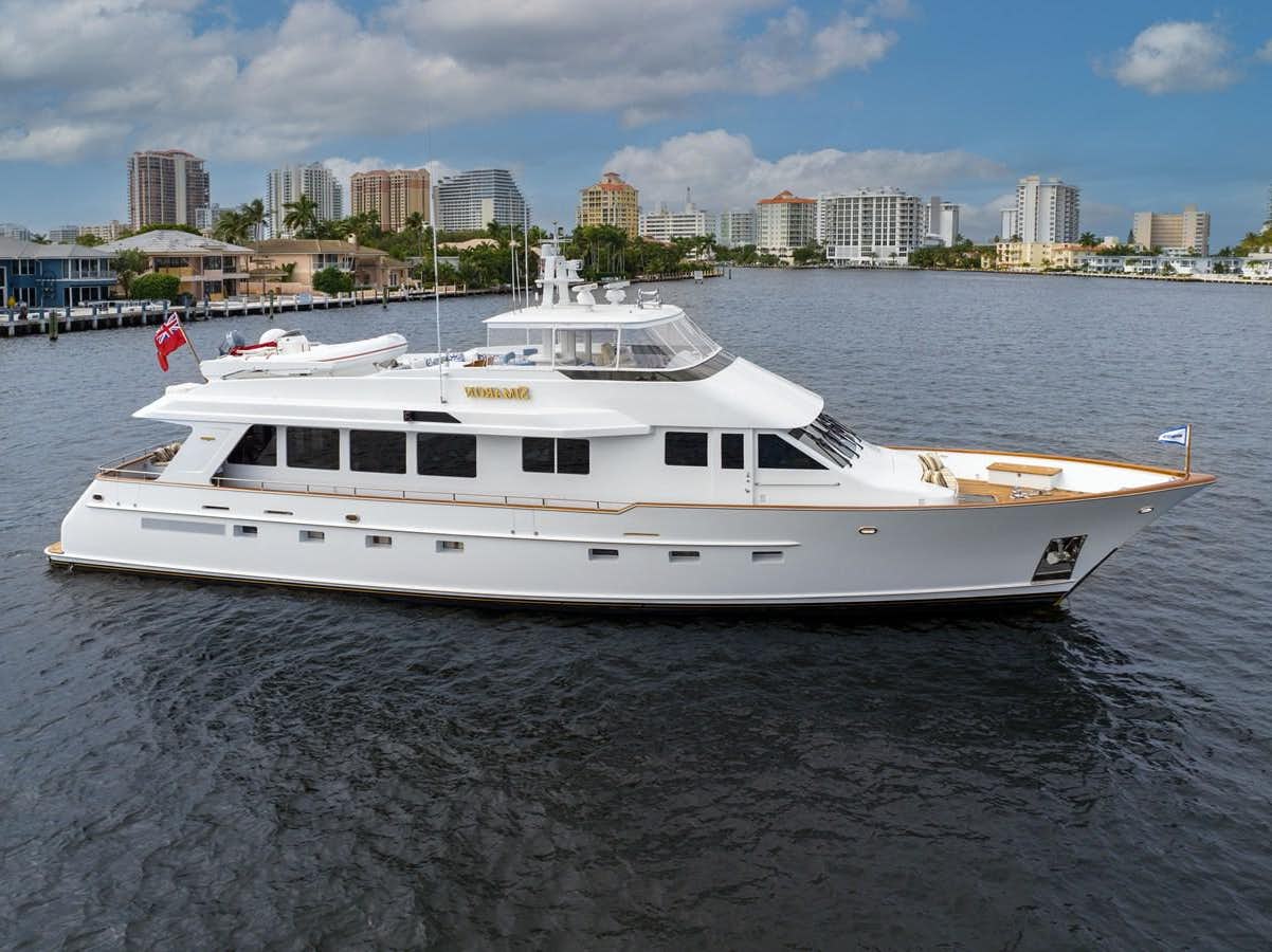 a white yacht in the water aboard SIMARON Yacht for Sale