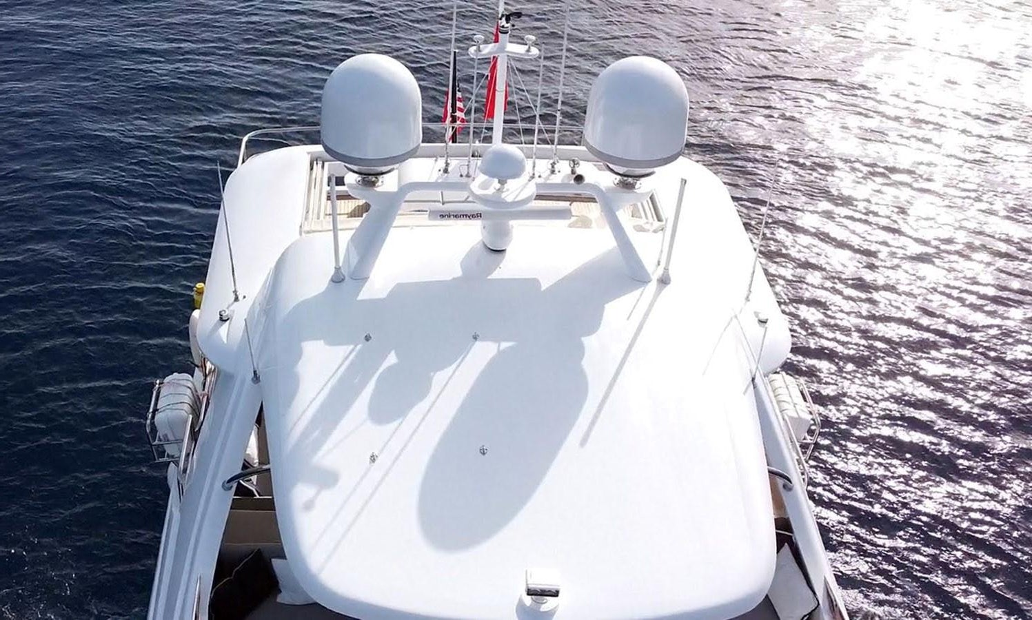 a white boat in the water aboard BASMACI Yacht for Sale