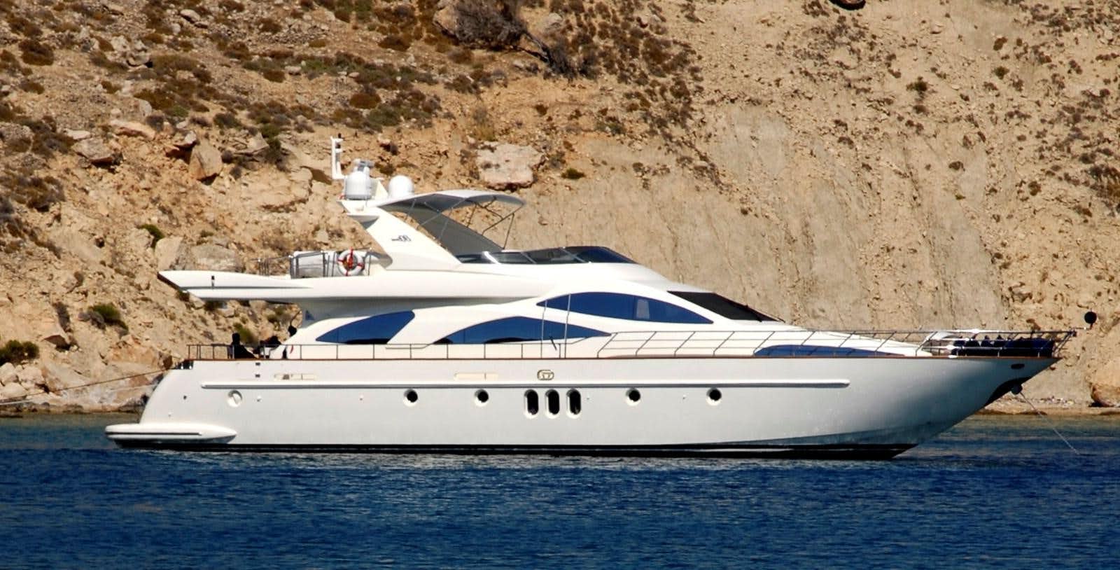 a white yacht on the water aboard FREE SPIRIT Yacht for Sale