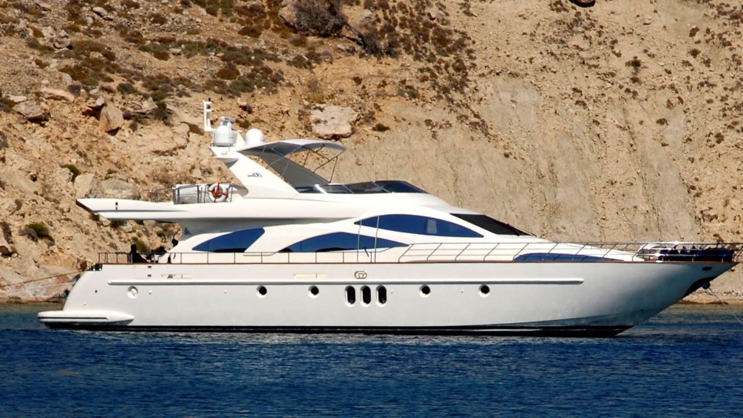 a white yacht on the water aboard FREE SPIRIT Yacht for Sale