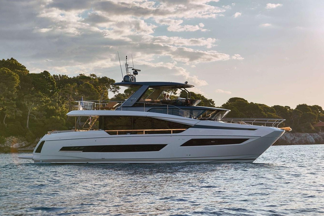a white yacht on the water aboard ROCKSTAR Yacht for Sale
