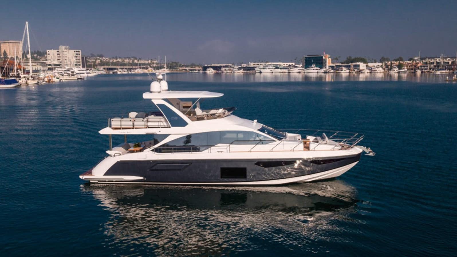 a white yacht in the water aboard PERSEVERANCE Yacht for Sale