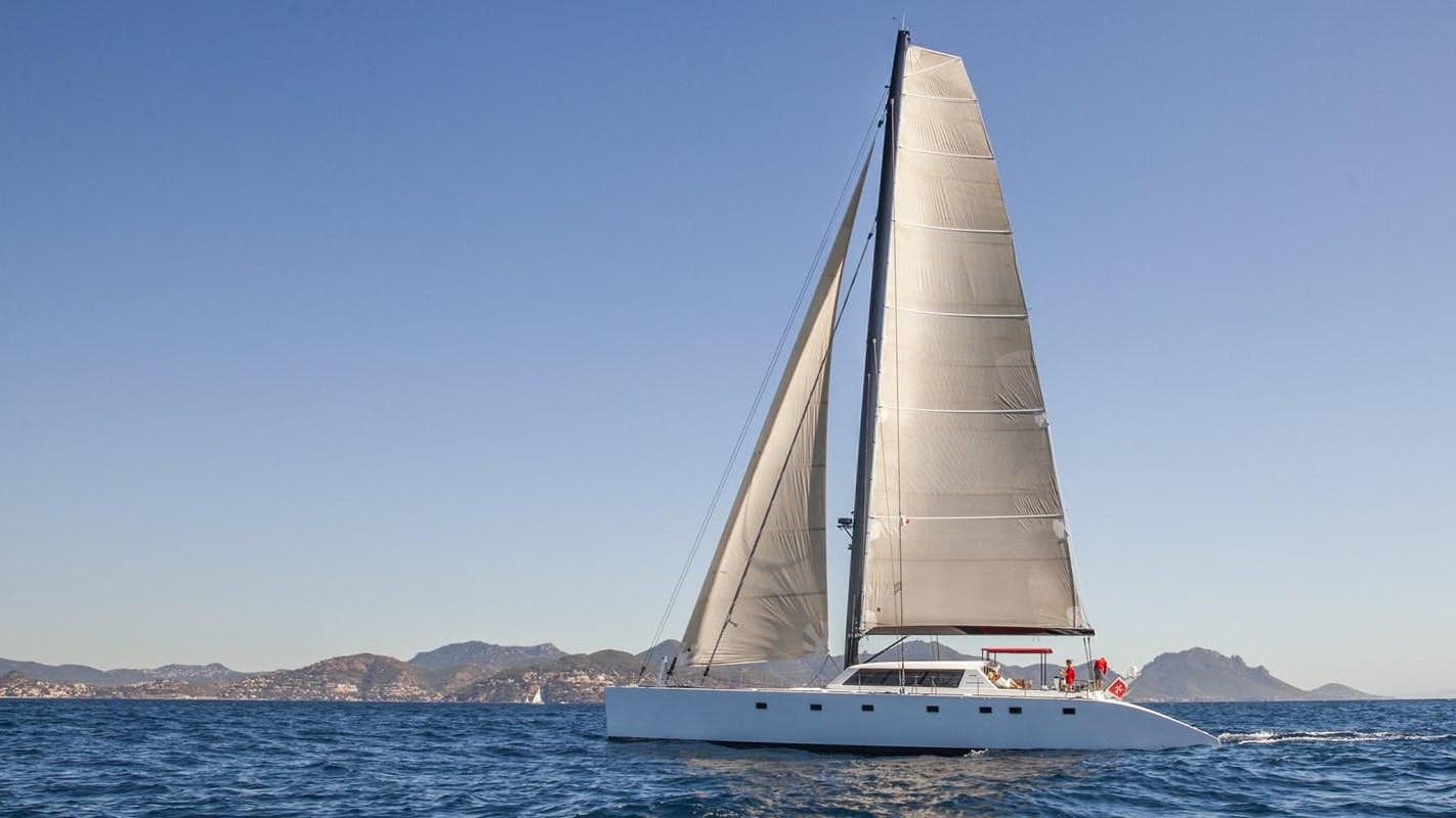 a sailboat on the water aboard TAJ Yacht for Sale