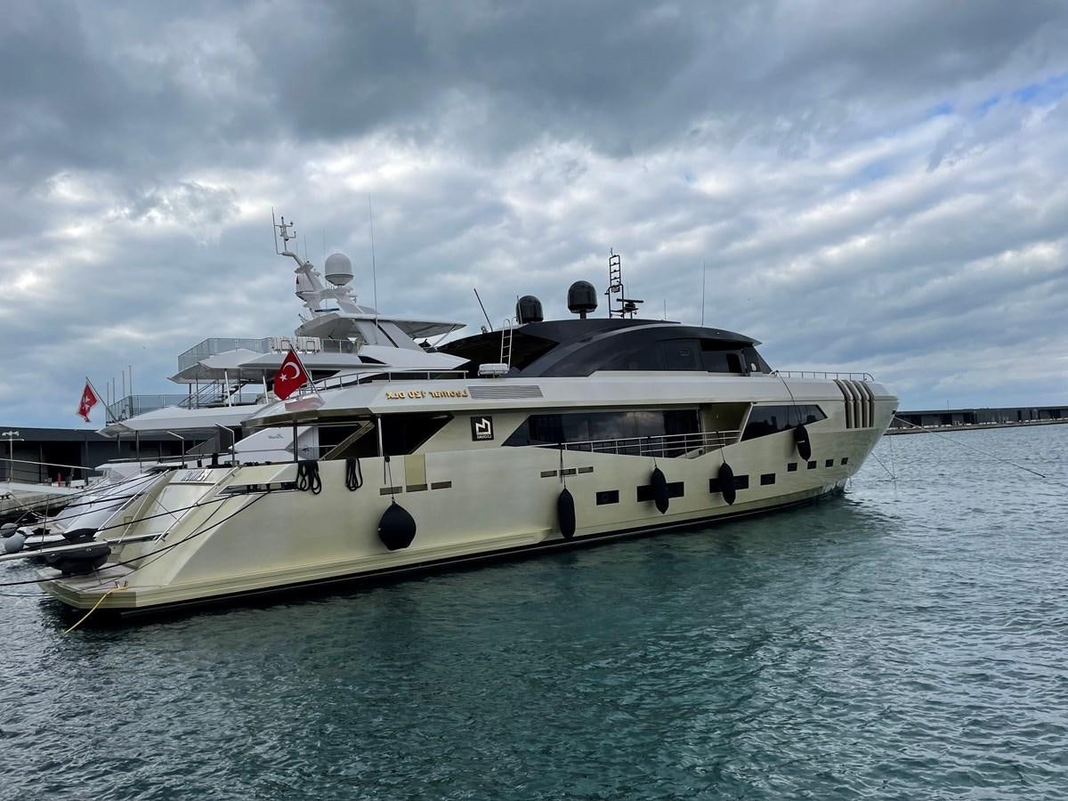 a white yacht in the water aboard AQUILA Yacht for Sale