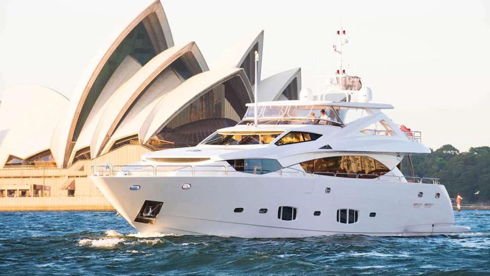 a large white boat aboard CHAOS Yacht for Sale