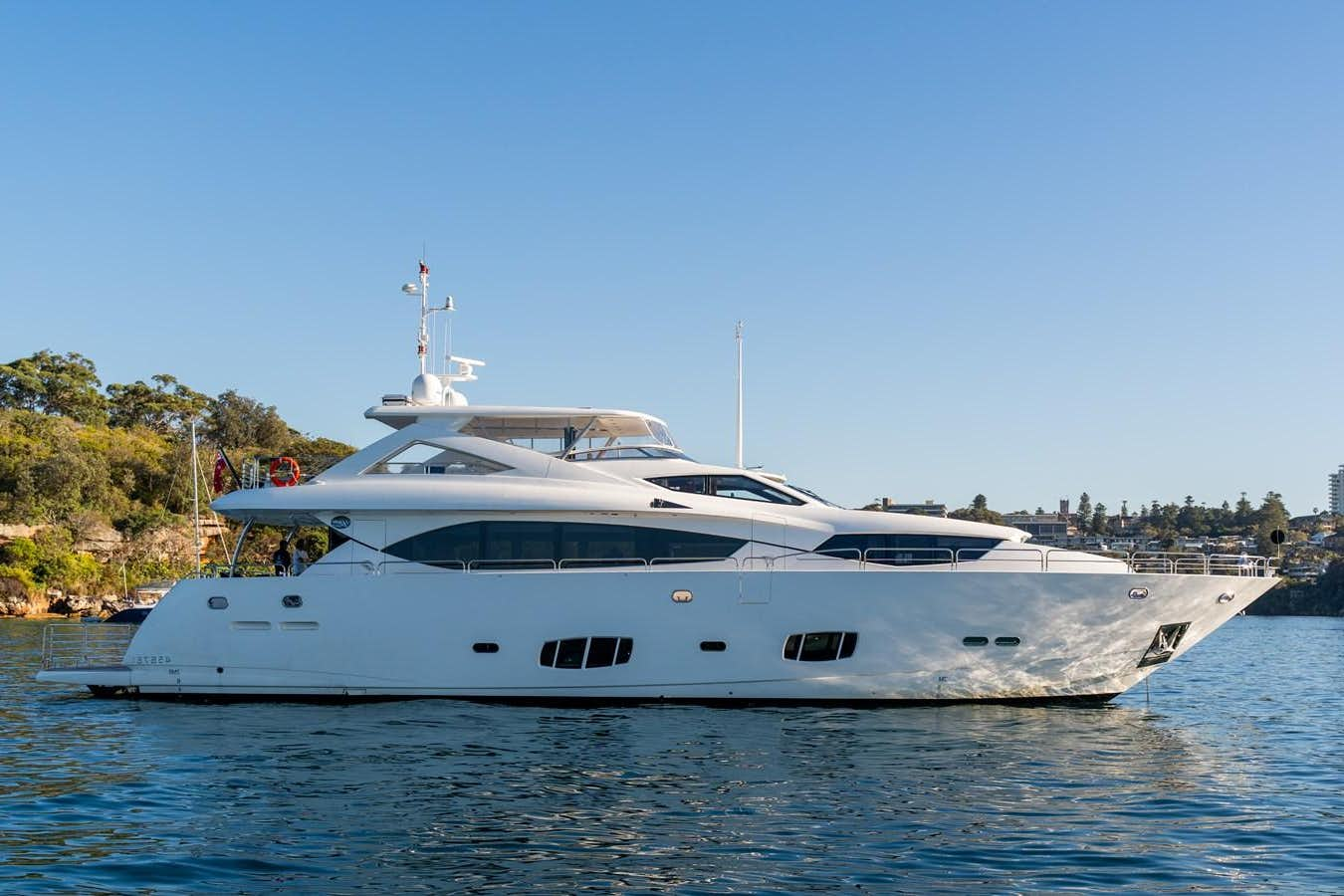 a white yacht on the water aboard CHAOS Yacht for Sale