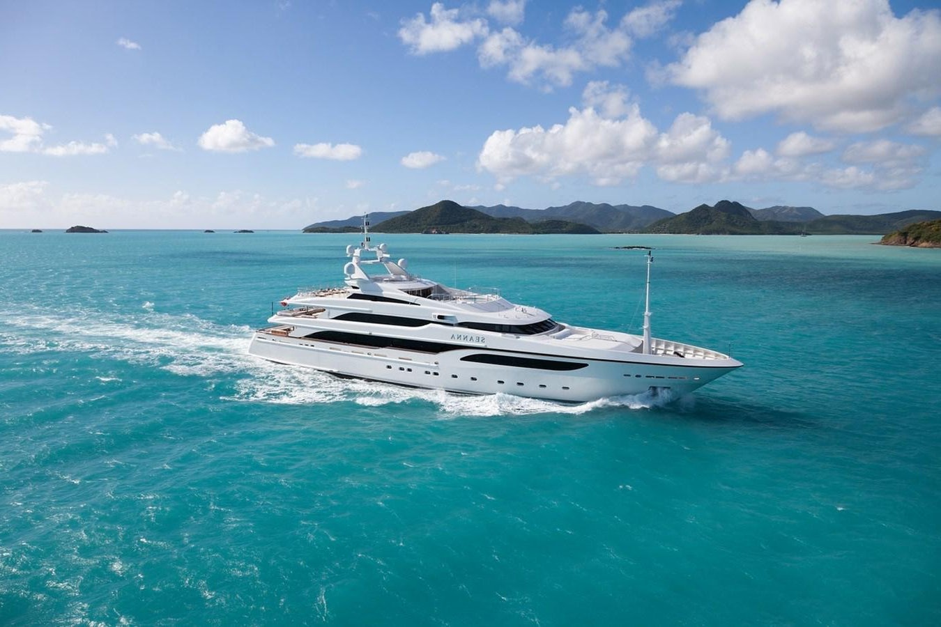 a white boat in the water aboard SEANNA Yacht for Sale