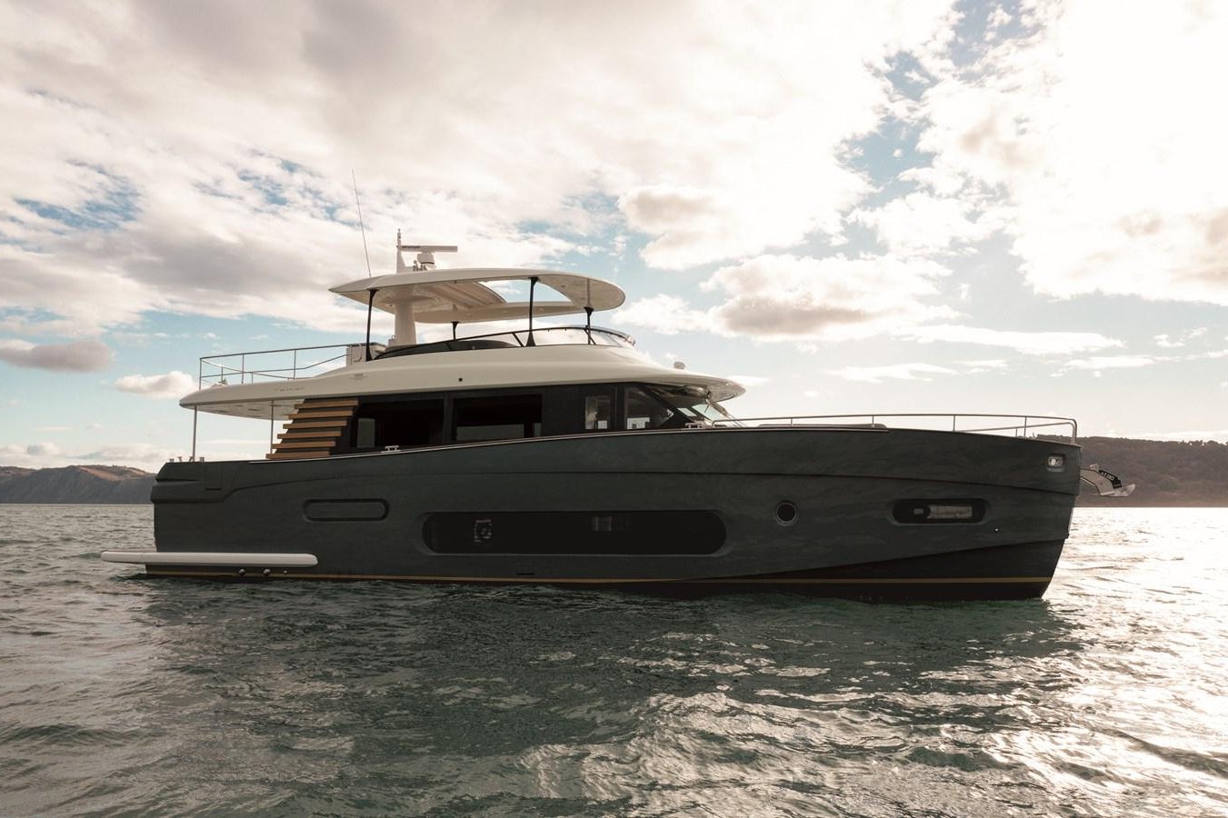a boat on the water aboard 2023 MAGELLANO 66 Yacht for Sale