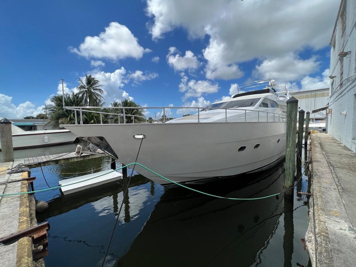 a boat docked at a pier aboard ØES3 Yacht for Sale