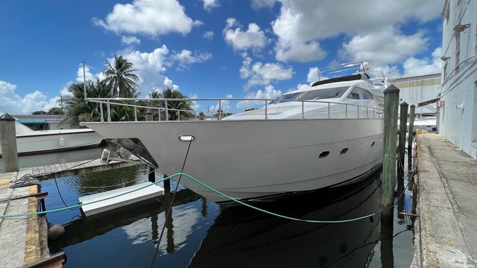 a boat docked at a pier aboard ØES3 Yacht for Sale