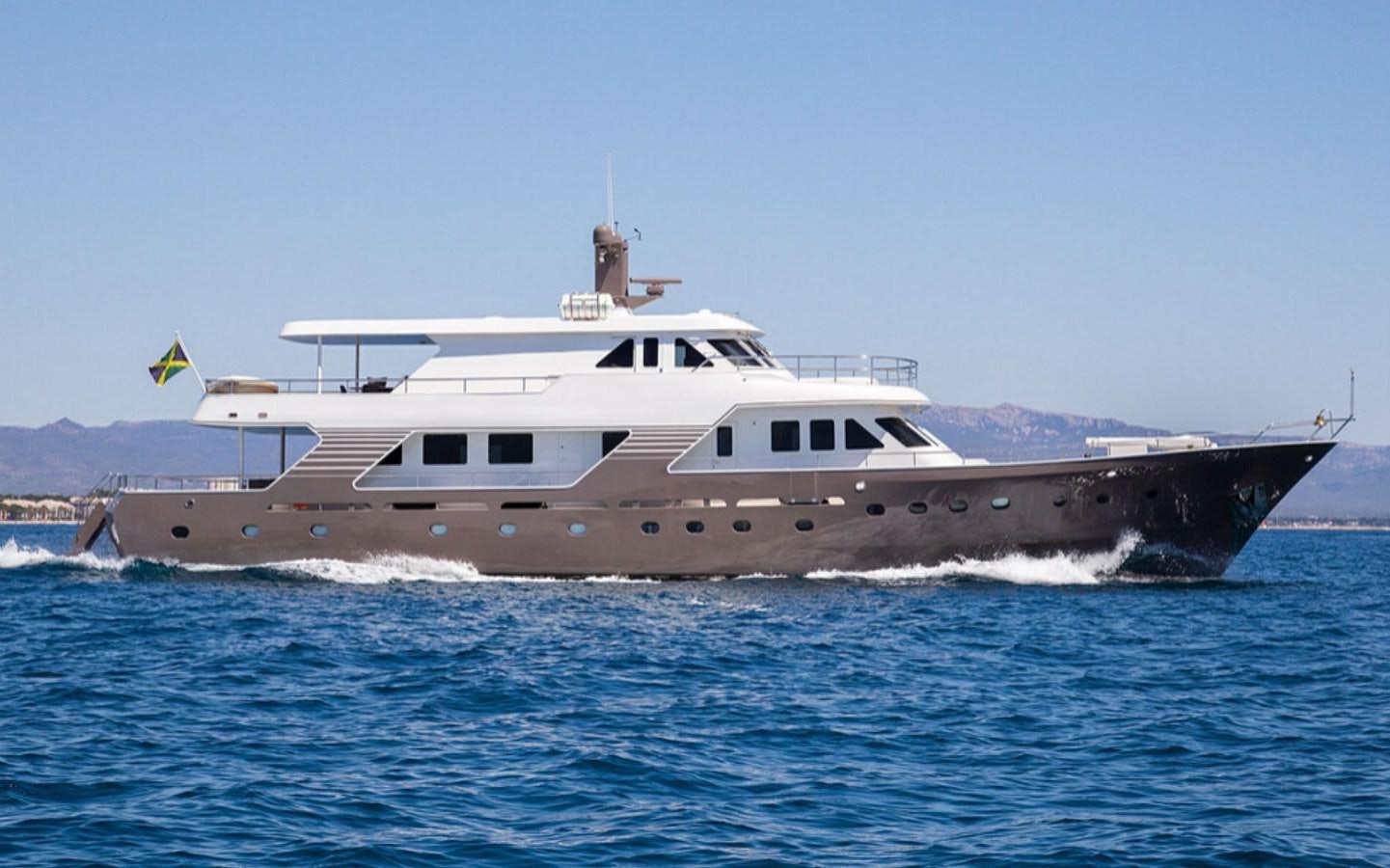 a large ship in the water aboard RA Yacht for Sale